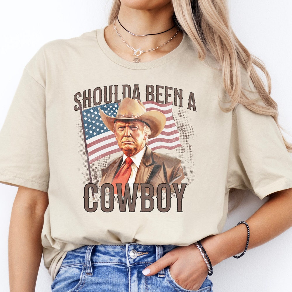 Should Have Been a Cowboy Funny Trump 2024 MAGA Shirt, 4th of July USA Shirt, Trump Supporter Gift, Trump Rally, Retro Western American Flag T-shirt & Hoodie